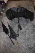 Three antique Victorian sun parasol or umbrella including lace worked and carved ebonised handles