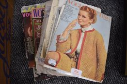 A collection of vintage knitting magazines.