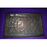 An arts and crafts hand worked copper tray having embossed Mackintosh style design