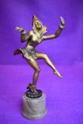 An art deco dancing figure sculpture metal cast on marble style base with a gilt finish marked