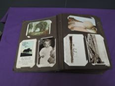 A large vintage Postcard Album including Scottish Scenes, black & white and colour cards