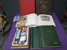 A collection of GB Stamps, mint and used, in albums, booklets, presentation packs and loose