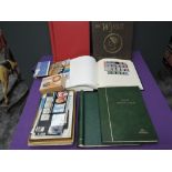 A collection of GB Stamps, mint and used, in albums, booklets, presentation packs and loose