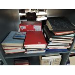 A shelf of World Stamps loose and in albums, mainly used