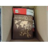 A box of GB and World Stamps, loose, in stock books and albums along with a small collection of