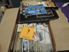 A large box of Trade Cards, loose and in albums, mainly Tea Cards