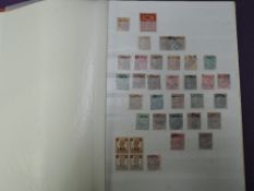 A stock book of India and Indian states Stamps, mint and used