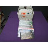 A collection of Royal Mail FDC and Presentation Packs, two World Stanp Albums and loose Stamps