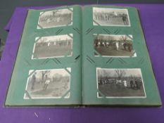 A vintage Postcard Album containing Local and World interest Postcards and Real Photographs, Kirby