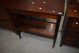 A vintage stained frame tea trolley