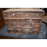 A small set of antique pine merchants/spice drawers, dimensions approx. 58 x 41 x 25cm