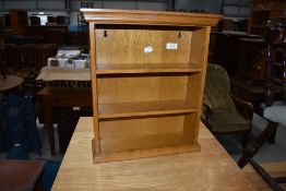 A small oak wall shelf, approx width 37cm, height 42cm