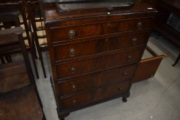 An early 20th Century mahogany chest of drawers, with rails and mirror to convert back to dressing