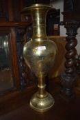 A vintage brass Eastern style vase, height approx. 60cm
