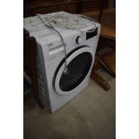 A Beko WDJ7523023W 7/5 washer dryer, almost like new, from second home with very little use, in