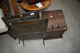 A Arts and Crafts hammered copper coal bucket and two similar lattice work fire screens