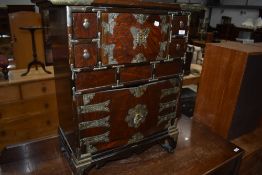 An Oriental side cabinet of small proportions, possibly Korean, width approx 55cm