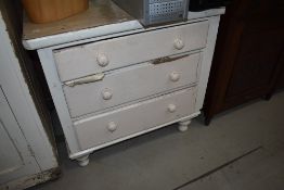 A 19th Century painted pine bedroom chest of three drawers on turned feet, width approx. 87cm