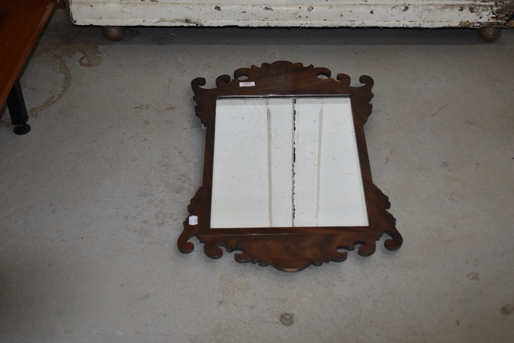 A 19th Century Chippendale style mahogany frame wall mirror