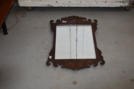 A 19th Century Chippendale style mahogany frame wall mirror