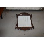 A 19th Century Chippendale style mahogany frame wall mirror