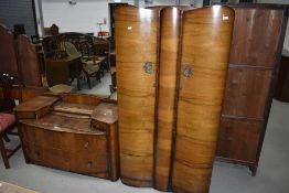 A mid 20th Century walnut ply wardrobe and dressing table