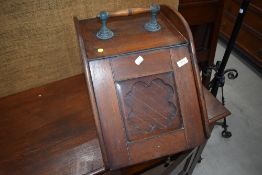 A Victorian mahogany coal purdonium