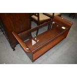 A vintage teak and bent ply coffee table/trolley with glass top, width approx. 122cm