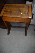 A traditional oak school desk