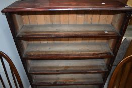 A stained pine open bookcase , having fixed shelves, approx width 96cm height 122cm