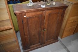 A 19th Century red stained pine shallow cabinet, having shelved interior, approx dimensions W100 D39