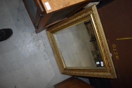 A vintage gilt plaster frame mirror, approx. 55 x 65cm