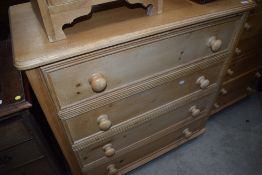 A natural pine chest of four long drawers, width approx. 92cm