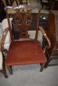 A 19th mahogany Chippendale style carver chair having typical decoration to back, later dralon