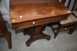 A William IV mahogany side table of plain form having frieze drawer and square tapered colum,