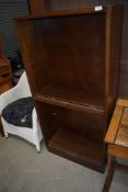 A vintage oak and ply bookcase (not stacking) with glass sliding doors, height approx. 144cm,