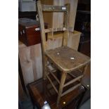A traditional childs kitchen or school chair, having double stretchers