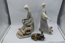 Two Lladro study, Young Women with Piglets 4572 and Girl with Goose and Puppy (af) and a Royal
