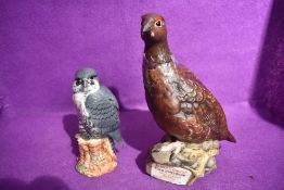 Two Royal Doulton decanters, Famous Grouse 'Matthew Gloag' and a Peregrine falcon for Beneagles (