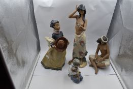 Four Nao Figurines, Boy with Puppy. Girl holding Bird, Girl in Wind and Girl with Flowers (af)