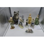 A selection of decorative Studies and Figurines, a Winstanley Cat, Metzler & Ortloff Children at