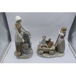 A Lladro study, The Cart, Girl with Cart holding boy and dog, model no 1245 and a Nao study, Girl