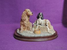 A Border Fine Arts study, Cocker Spaniel and Two Pups B0312B, Golden Spaniel with black & white