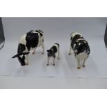 Three modern ceramic Border Fine Arts Studies, Friesian Bull, Friesian Cow and Friesian Calf