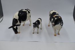 Three modern ceramic Border Fine Arts Studies, Friesian Bull, Friesian Cow and Friesian Calf