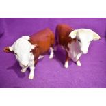 Two Beswick Hereford bull figure studies Bull 949 and Polled Bull 2549A