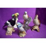 Five Beswick figure studies of birds, Parakeet 930, Song thrush 2308, Cuckoo 2315, Magpie 2305 and