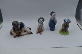 Three Royal Copenhagen figures, Boy with Dog 1502, Boy 3250 and Snow Baby with Teddy Bear 019