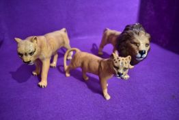 A first version set of figure studies the Lion Family by Beswick, Lion 1506, Lioness 1507 and Lion