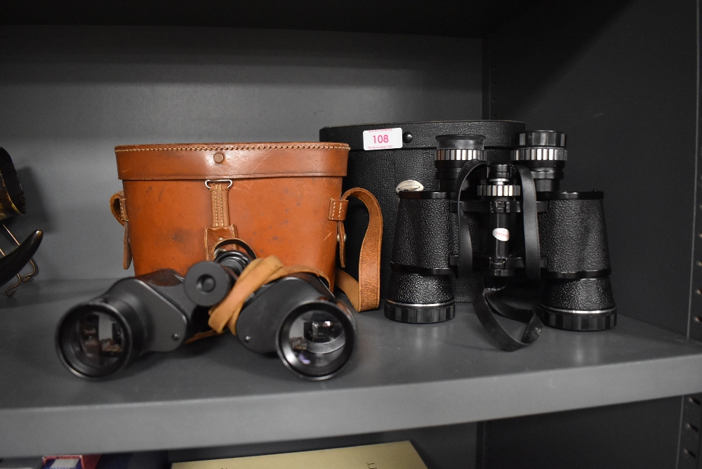 Two pairs of vintage binoculars including Boots 8x40 and Beck Kassel 8x30